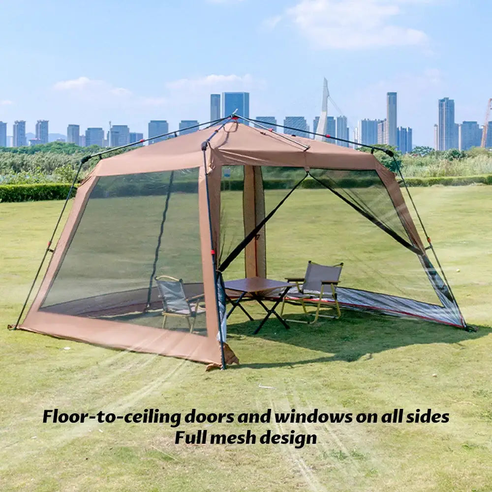 Outdoor canopy tent with mesh walls and a table and chairs inside.