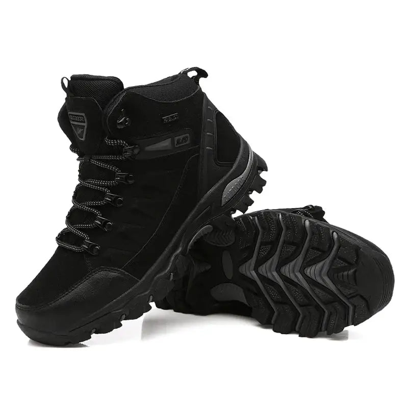 Pair of black hiking boots with rugged soles.