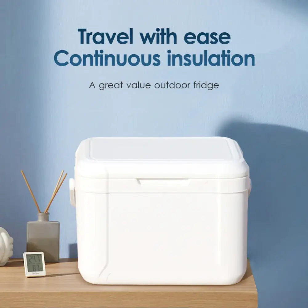 White portable outdoor fridge or cooler with a cube-like shape.