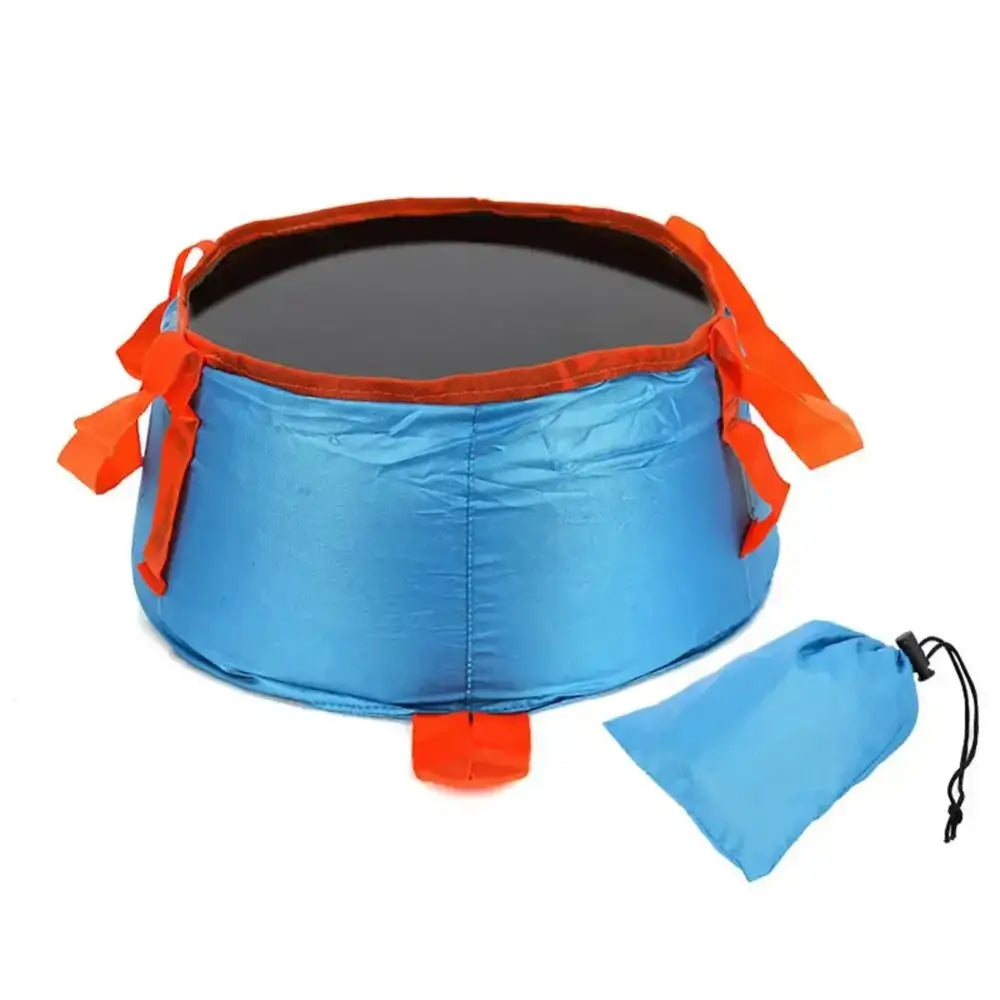 Collapsible blue and orange outdoor basin or sink with a drawstring storage bag.