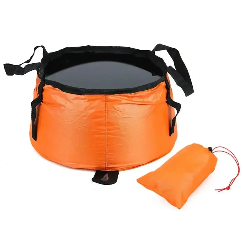 Collapsible orange and black camping sink or basin with a matching storage pouch.