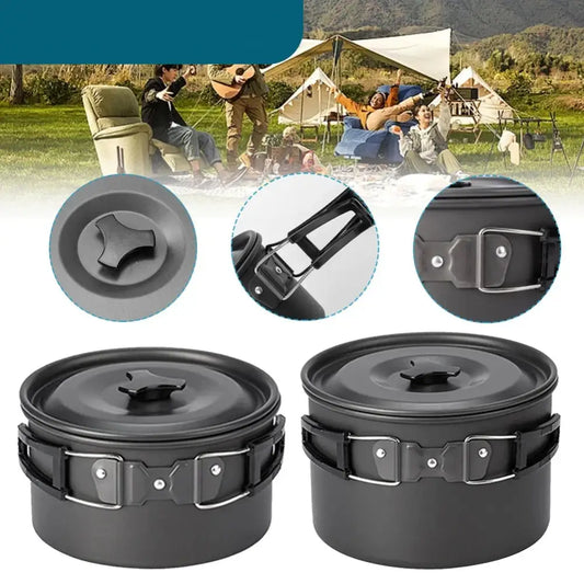 Camping cookware set featuring compact, stackable pots with folding handles.