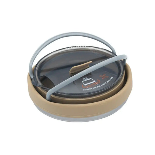 Portable camping stove with a round shape and folding handle.