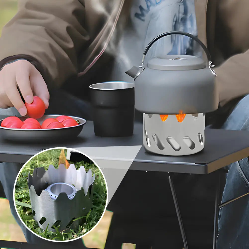 Portable camping stove with a teapot on top and a flame visible underneath.