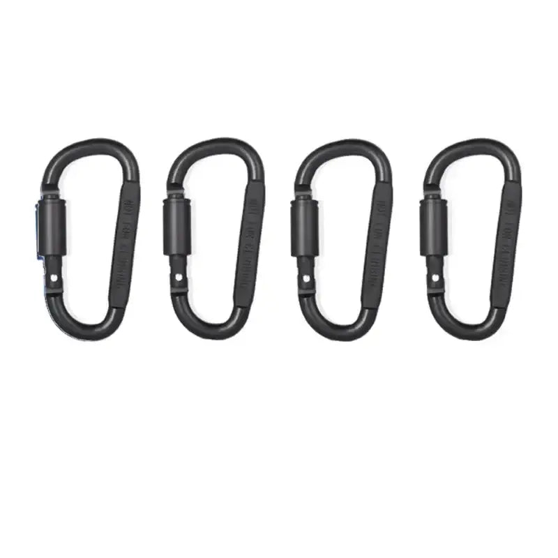 Four black carabiners with screw-lock gates arranged in a row.