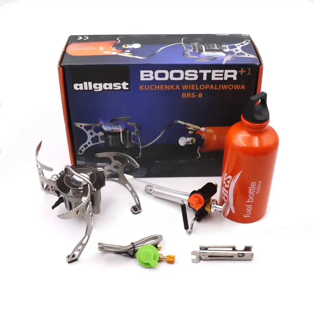 Camping stove with attached fuel bottle and accessories.