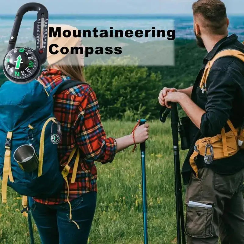 Mountaineering compass with a black carabiner-style clip.