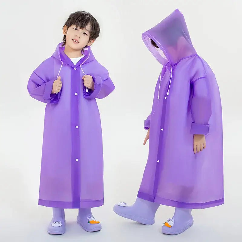 Purple children’s raincoat with snap buttons and a hood.