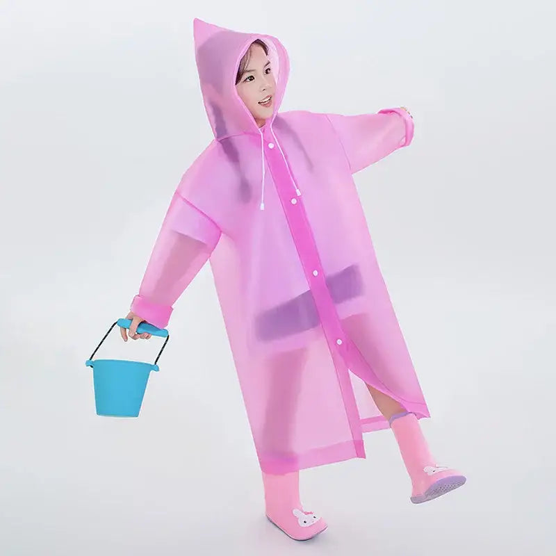 Pink translucent raincoat with a hood and matching boots.