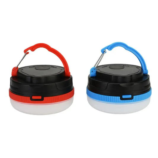 Portable LED camping lanterns in red and blue colors with folding handles.