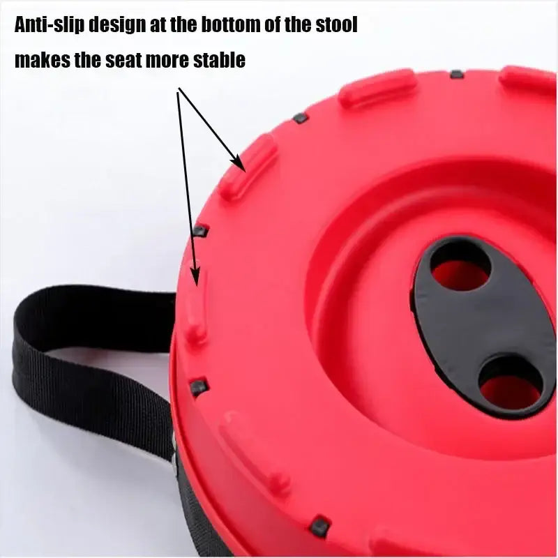 Red circular stool seat with anti-slip design and a black strap.