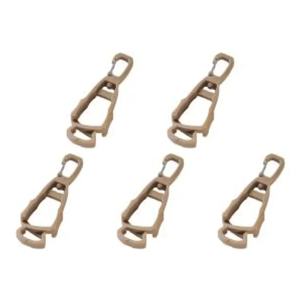 Tan-colored zipper pulls or sliders arranged in a group of five.