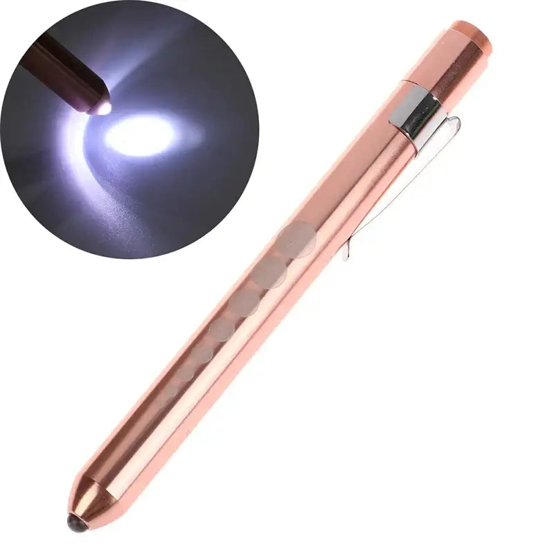 Rose gold pen-shaped flashlight with a clip.