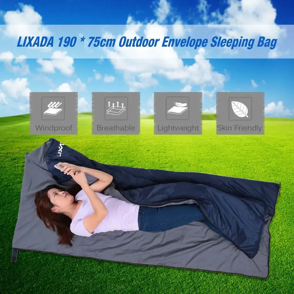 Outdoor envelope sleeping bag with a person lying inside, showcasing its features.