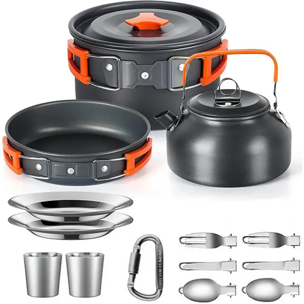 Compact camping cookware set with pots, pans, utensils, and accessories in black and orange colors.