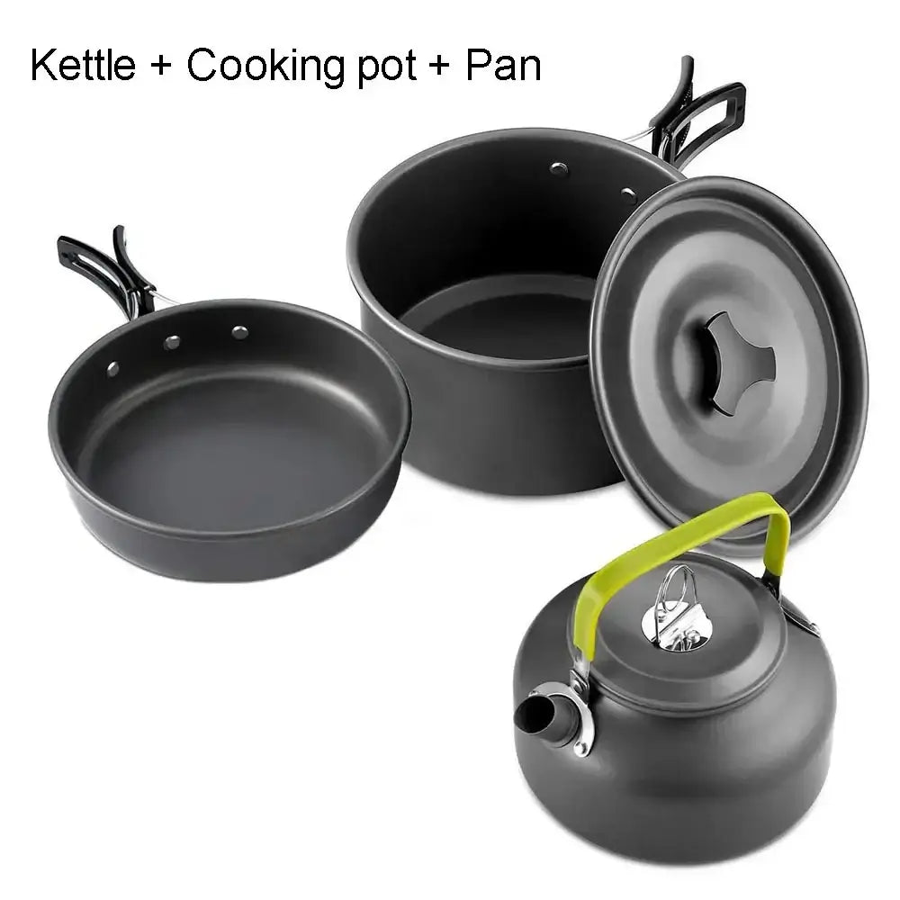 Camping cookware set consisting of a kettle, cooking pot, and frying pan in dark gray color.