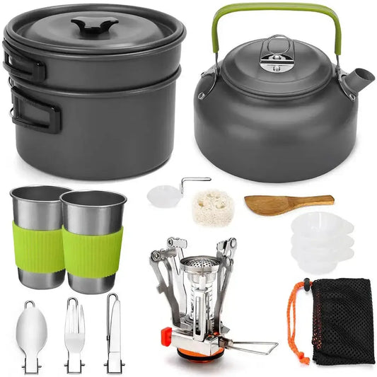 Camping cookware set including pots, kettle, cups, utensils, and a portable stove.