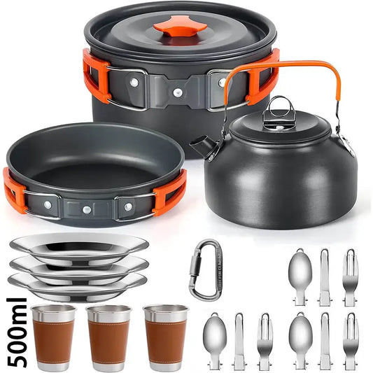 Camping cookware set with pots, kettle, utensils, and cups.