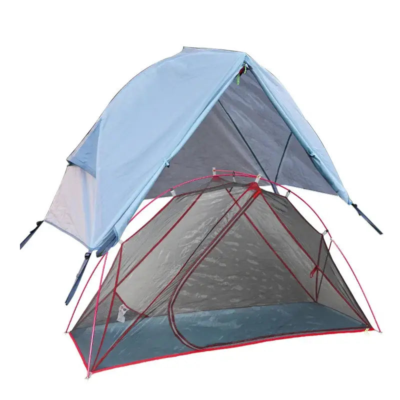 Camping tent with a light blue rainfly and red support poles.