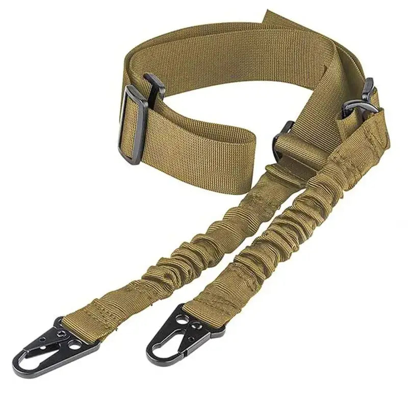 Tactical two-point sling in tan color with adjustable strap and metal clips.