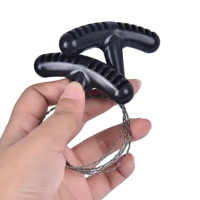 Wire saw with black plastic T-shaped handles.