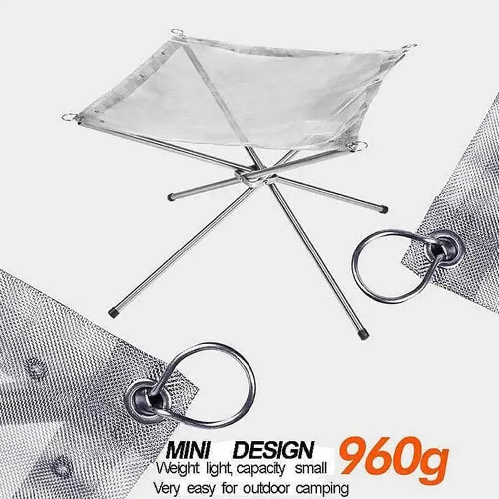 Collapsible camping table with a fabric top and metal legs.