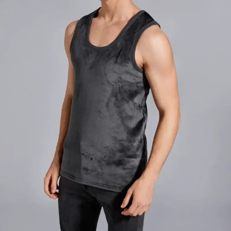 Dark gray sleeveless tank top with a subtle pattern worn by a person.