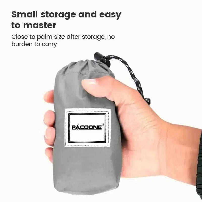 Gray drawstring storage pouch held in a hand.