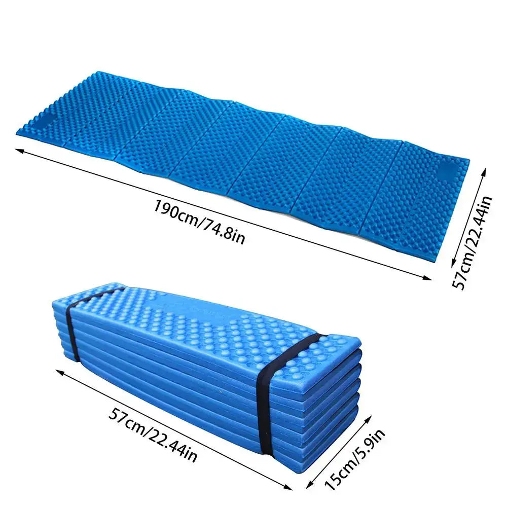 Blue foam camping sleeping pad that can be folded for compact storage.