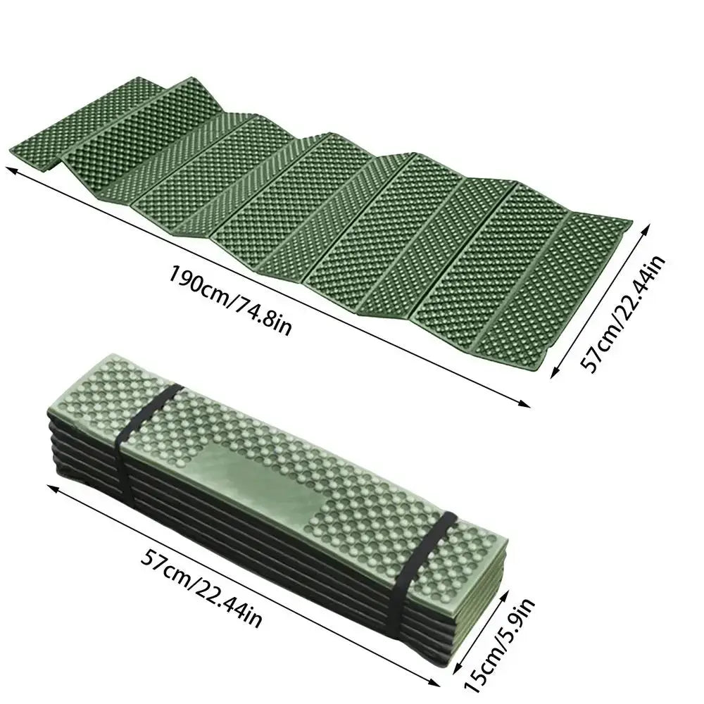 Foldable green foam camping mat with textured surface and dimensions labeled.