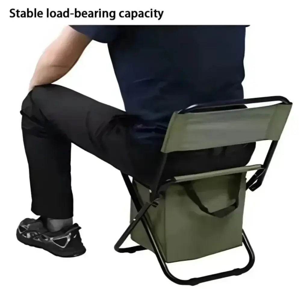 Folding camping chair with a backrest and armrests.