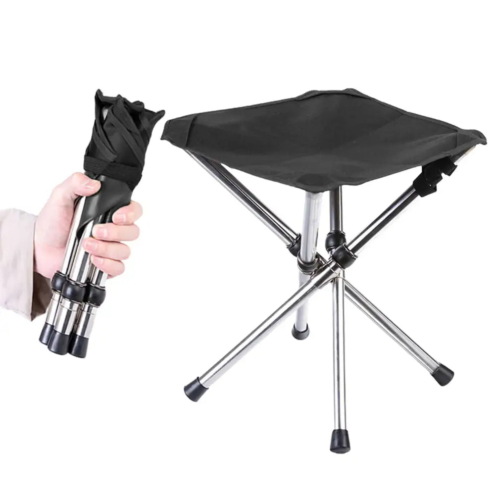 Collapsible camping stool with black fabric seat and metal legs.