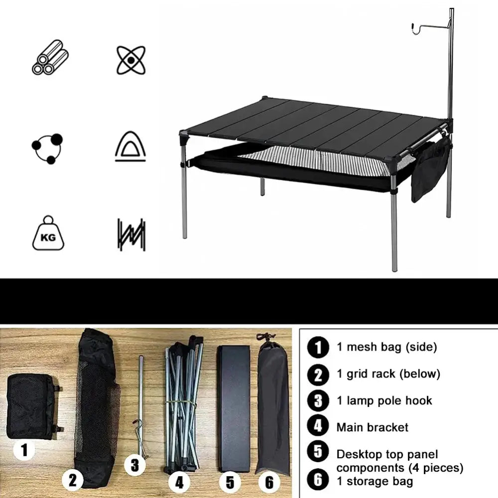 Portable camping table with a black top and metal legs.