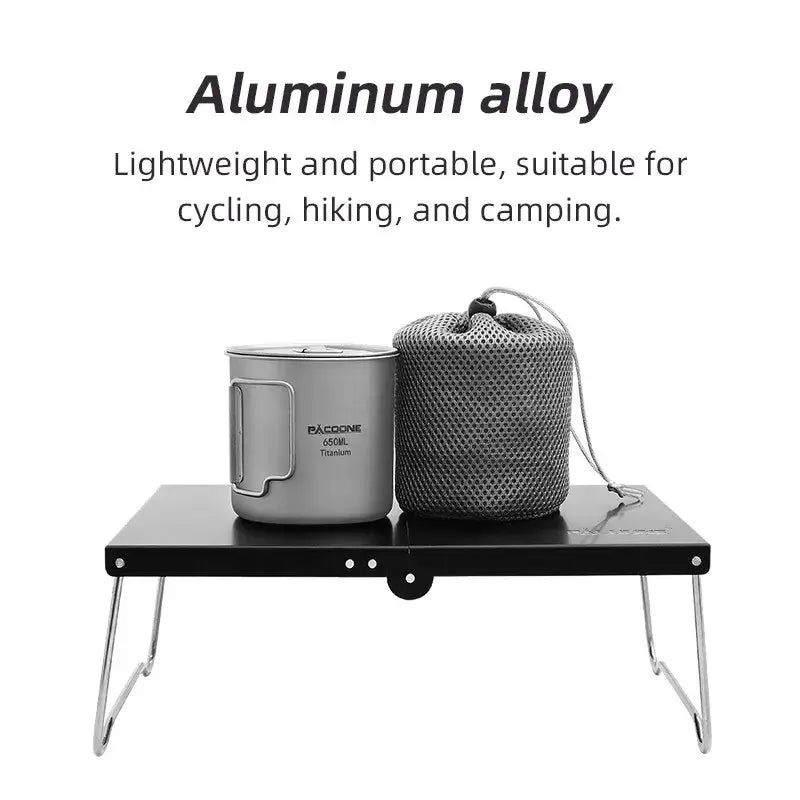 Folding camping table with aluminum alloy construction.