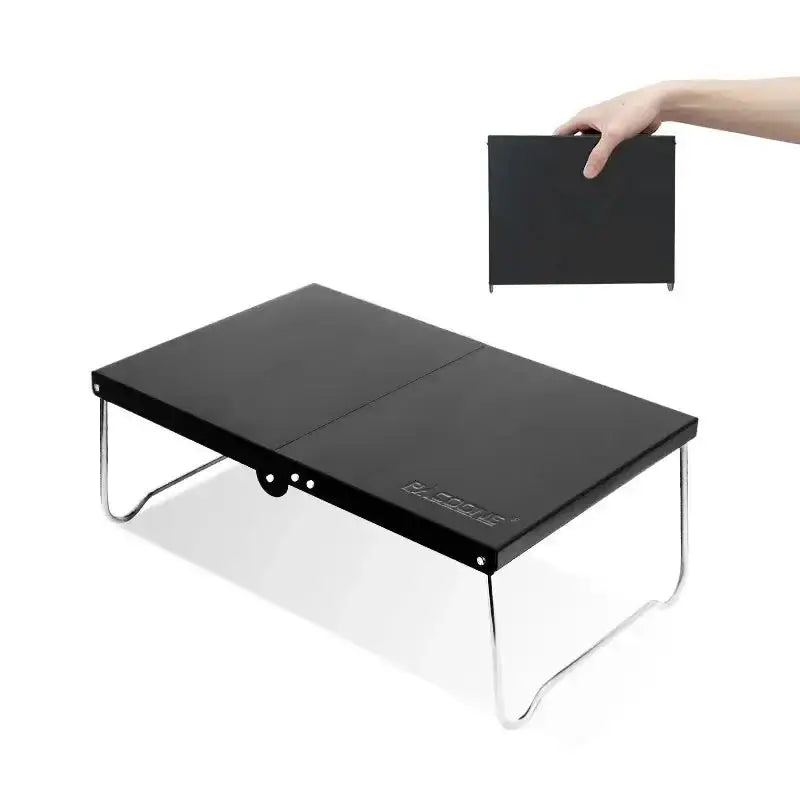 Foldable black table or desk with metal legs.