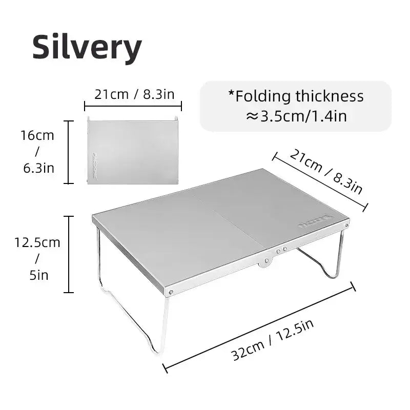 Folding silver-colored table or desk with dimensions labeled.