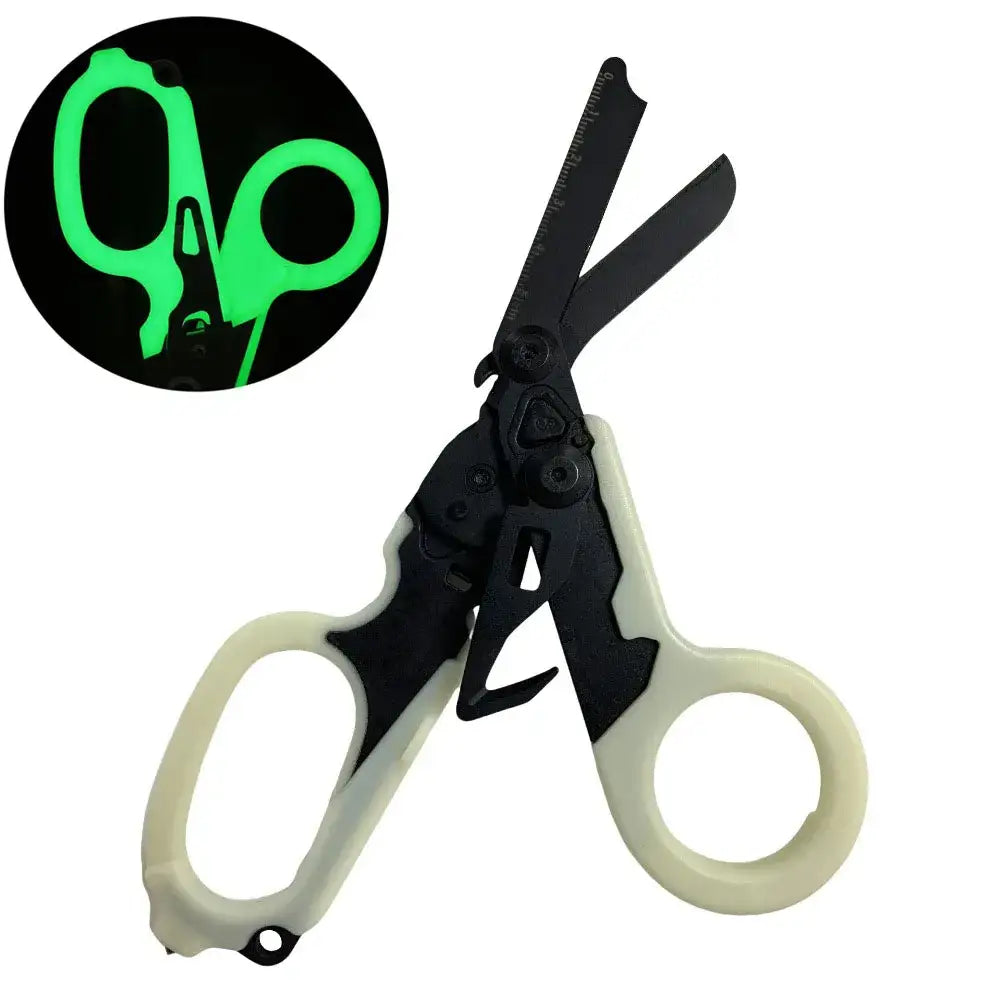 Pair of black and white scissors with a glow-in-the-dark green logo.