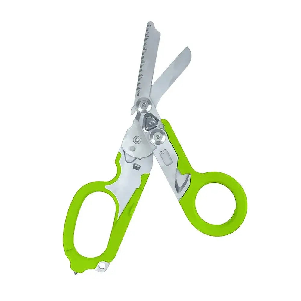 Pair of green-handled scissors with multiple blades and a ruler edge.