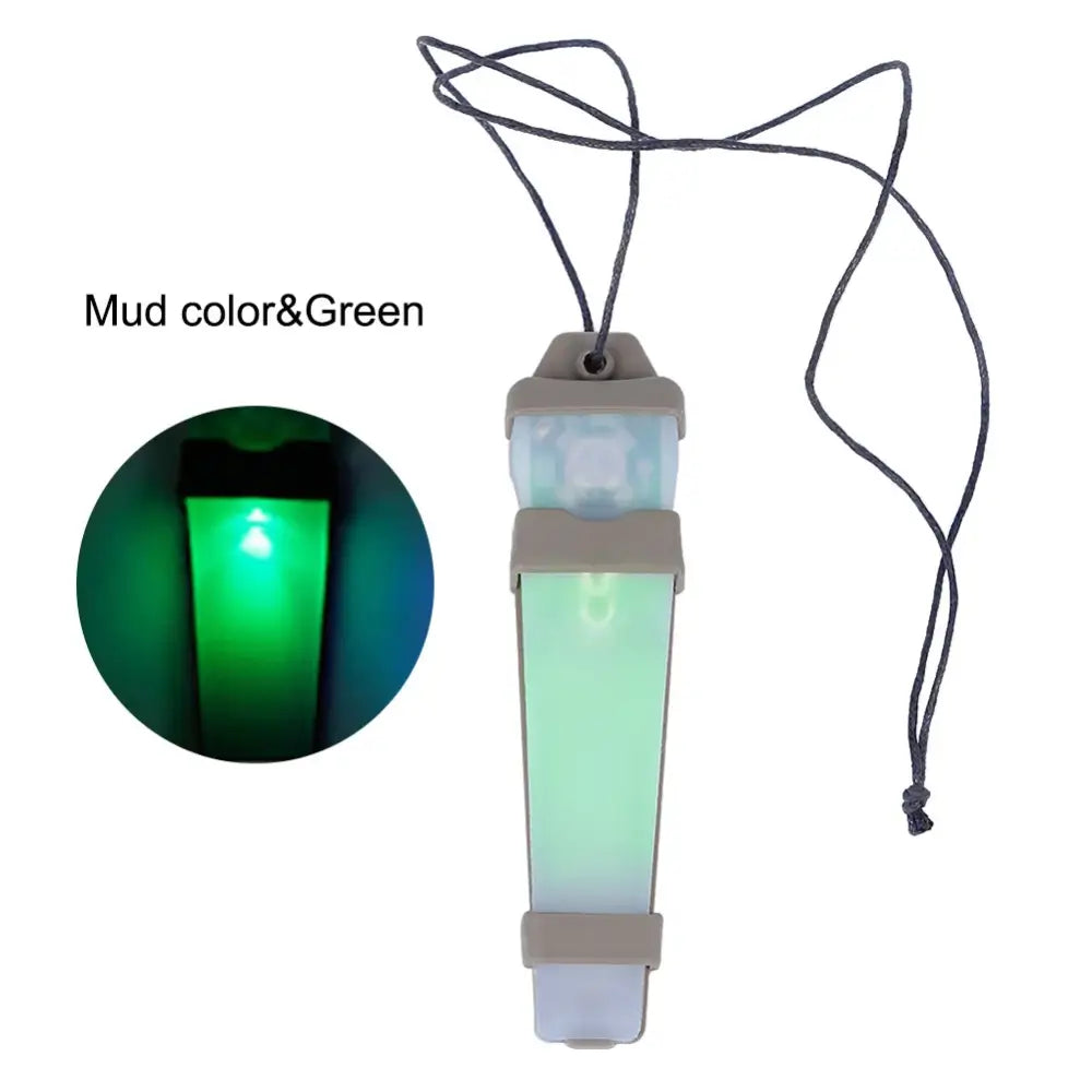 Glowing green stick-shaped device with a cord for wearing around the neck.