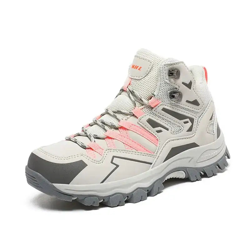 Hiking boot with a light gray and pink color scheme, featuring a rugged sole and mesh upper.