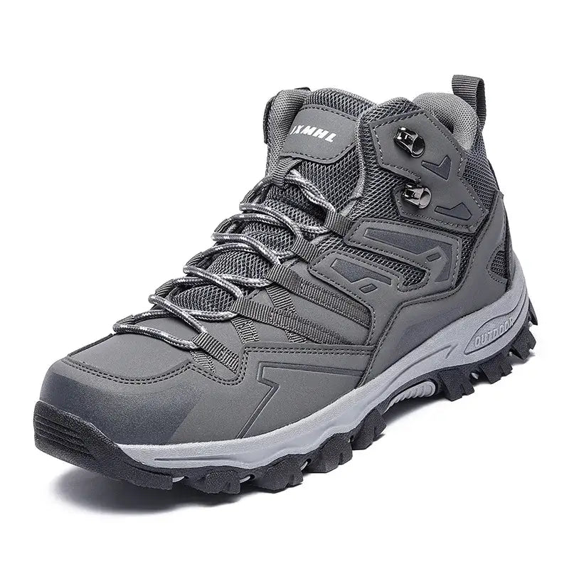 Gray hiking boot with rugged tread and ankle support.