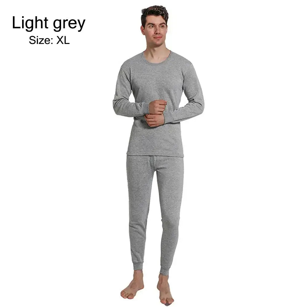 Light grey long-sleeved thermal underwear set worn by a man.