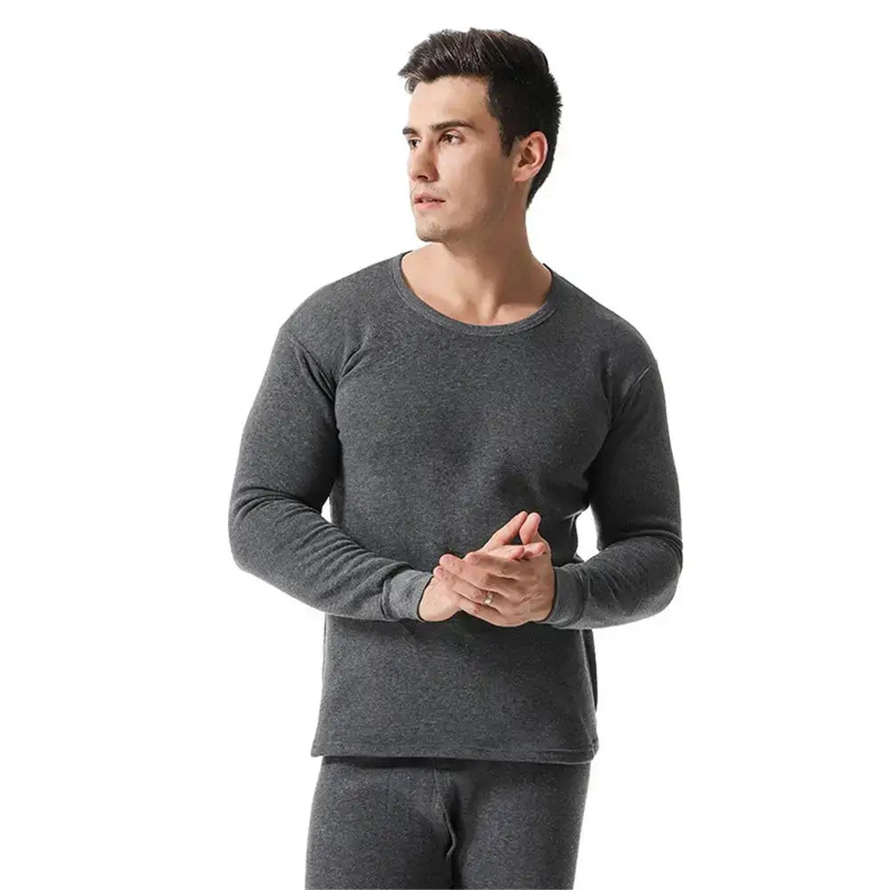 Man wearing a gray long-sleeved thermal shirt and matching pants.