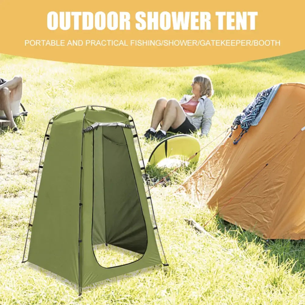 Green pop-up privacy tent for outdoor showering or changing.