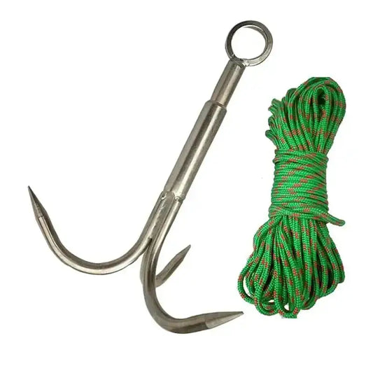 Stainless steel grappling hook with three prongs alongside a coiled green rope.