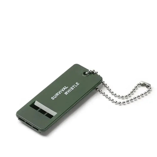 Green survival whistle with a metal chain attached.