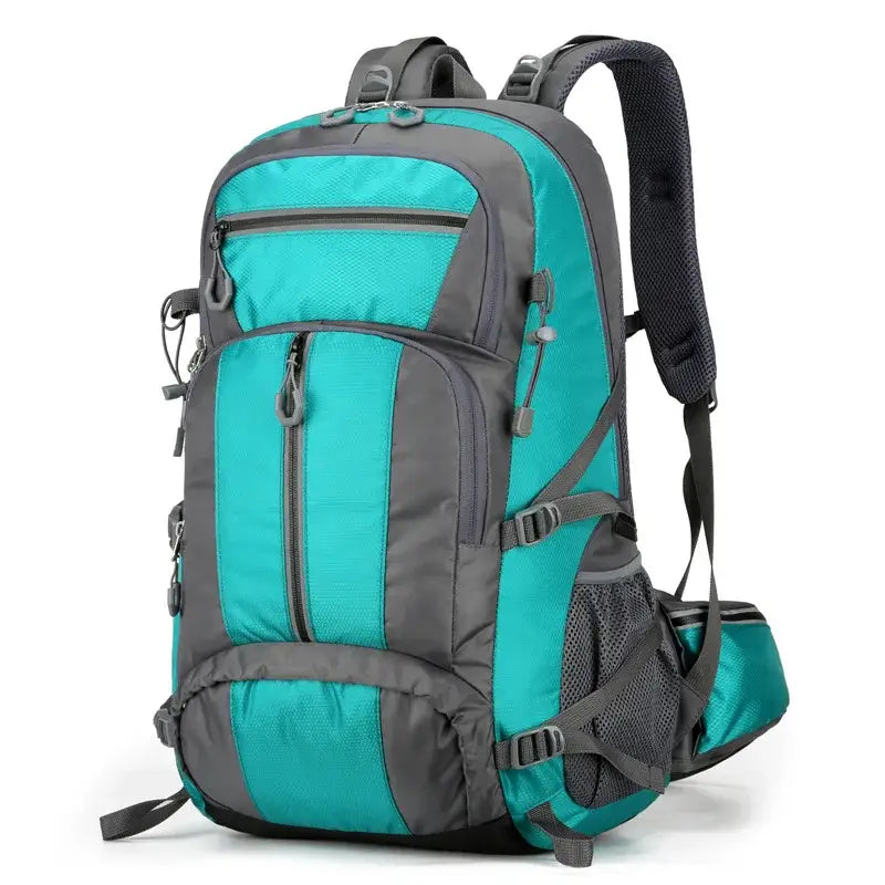 Teal and gray hiking backpack with multiple compartments and straps.