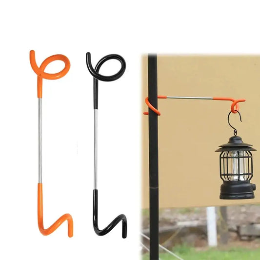 Flexible metal hooks with curved handles for hanging outdoor gear or lanterns.