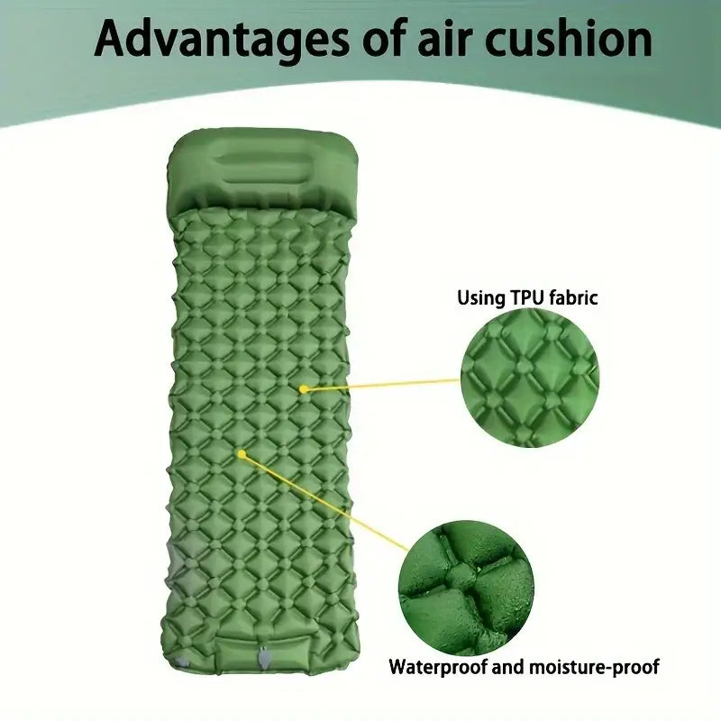 Inflatable camping sleeping pad with a textured surface made of green material.