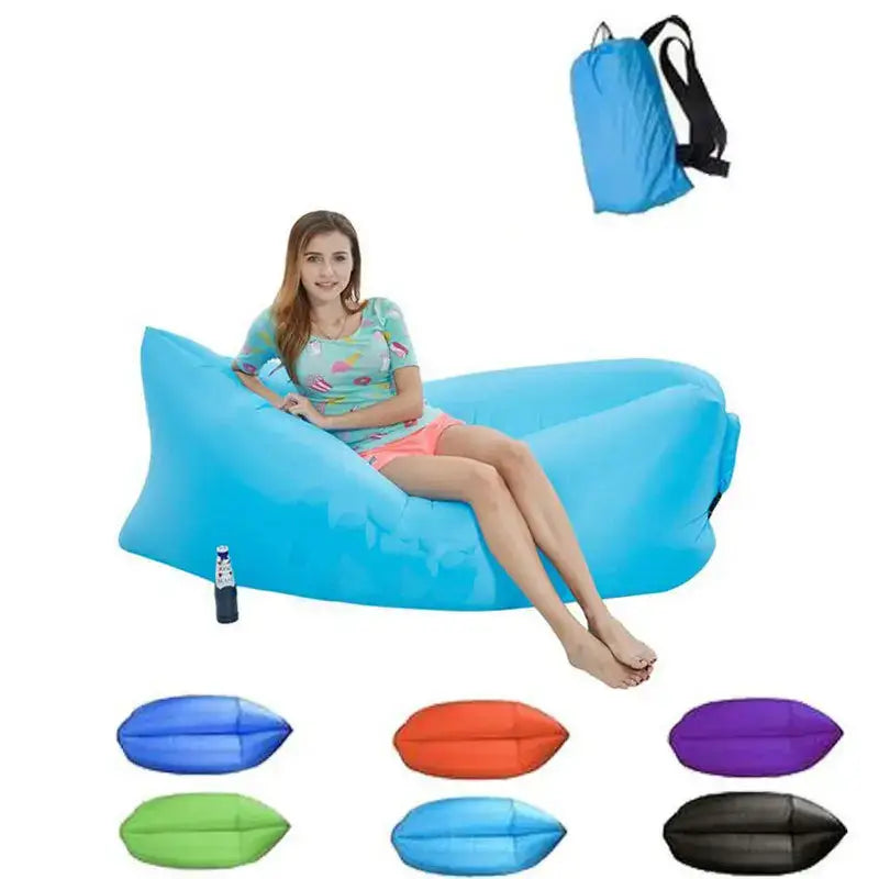 Inflatable lounger or air sofa in bright blue color.